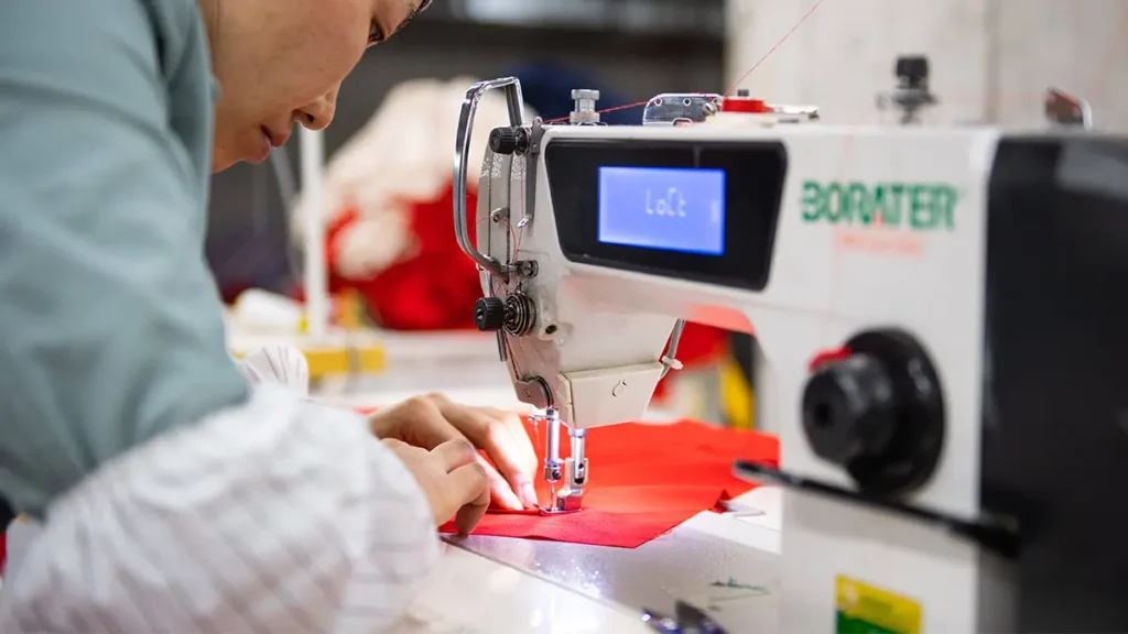 How Custom Apparel Suppliers Manage Production Capacity Across Multiple Corporate Orders 1026